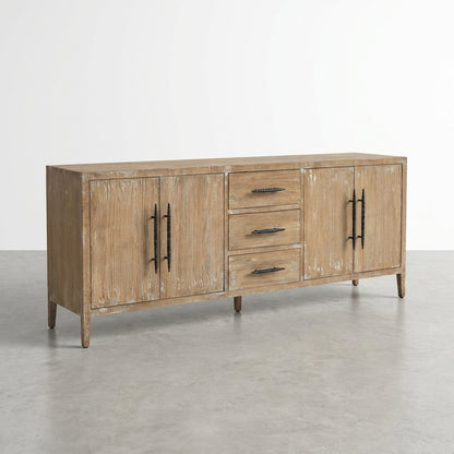 Rustic wooden sideboard with drawers and cabinet doors, black handles.