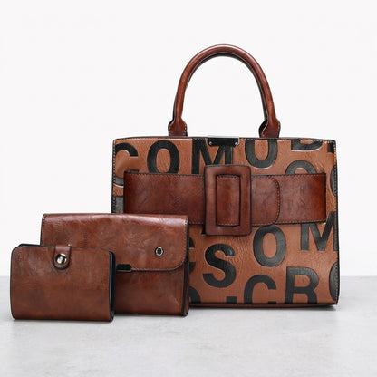 Brown leather bags with large black lettering.