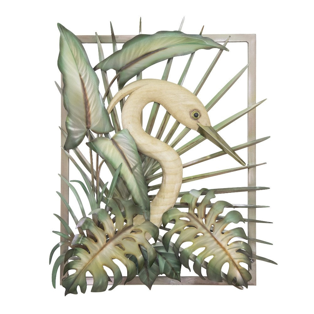 Heron sculpture amidst tropical leaves.