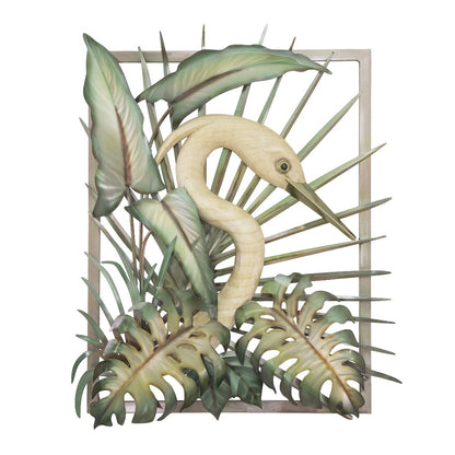 Heron sculpture amidst tropical leaves.