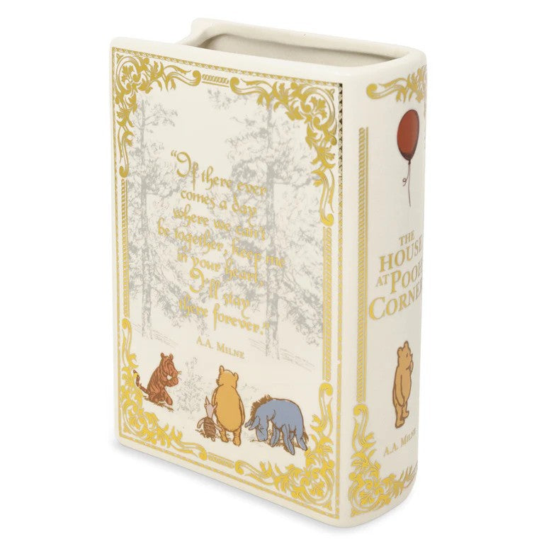 Book-shaped vase with Winnie the Pooh illustration and A.A. Milne quote.