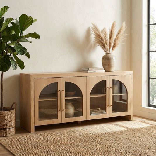 Wooden cabinet with four arched glass doors and sleek handles.