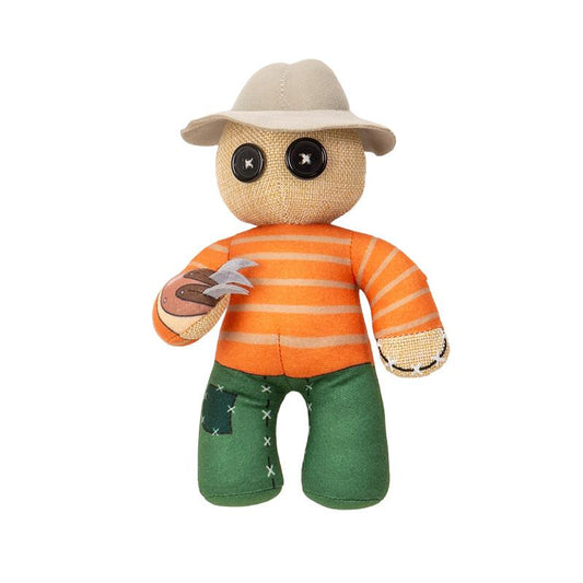 Plush doll with button eyes, striped shirt, hat, and claw hand.