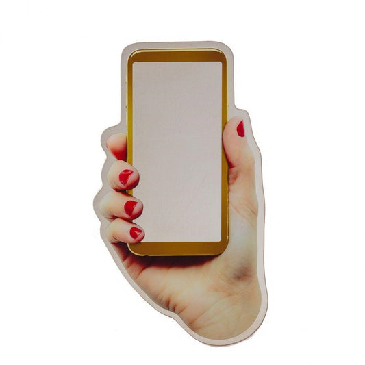 Hand holding a blank phone, red polished nails.