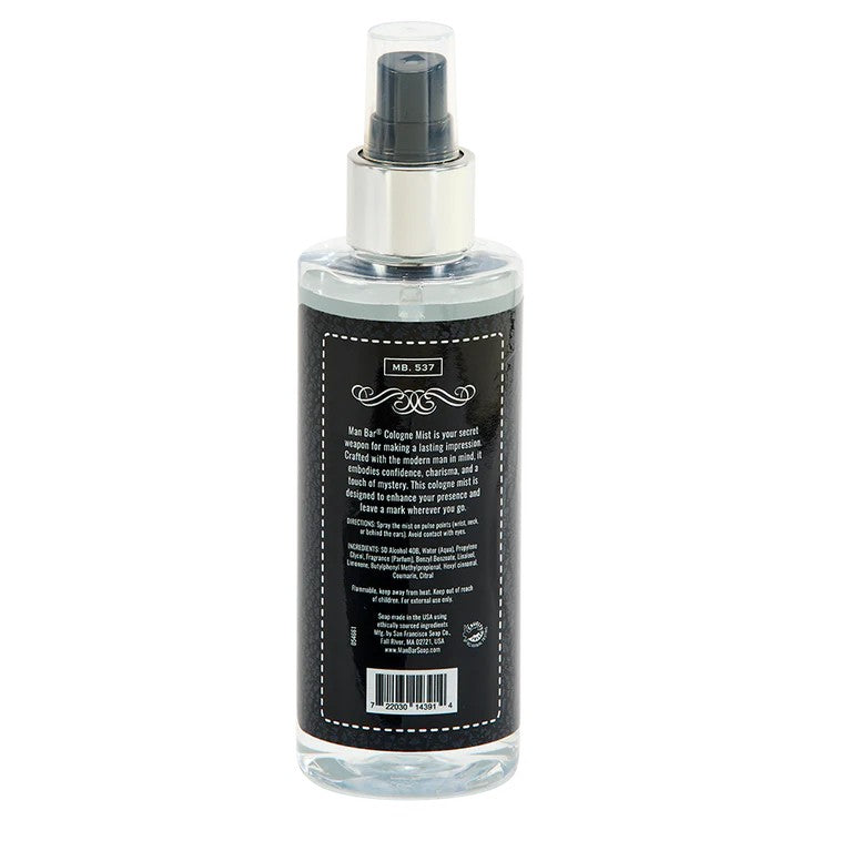 Cologne spray bottle with detailed black label and text.