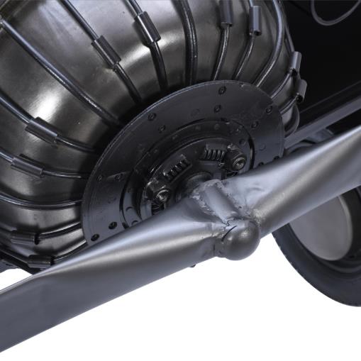 Close-up of an automotive component with metallic gears and bolts.