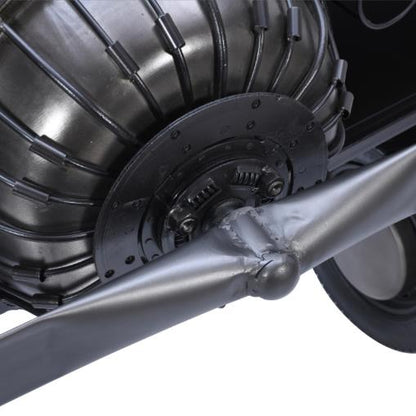 Close-up of an automotive component with metallic gears and bolts.