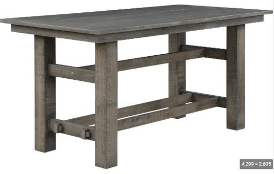 Rustic wooden table with sturdy legs and a rectangular top.