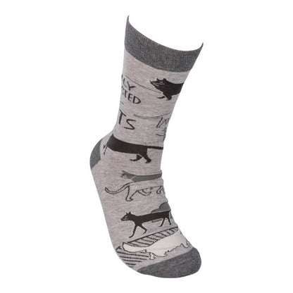 Gray sock with black cat pattern and "Cats" text.