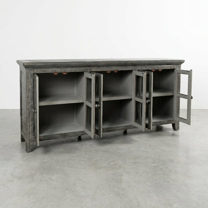 Gray wooden cabinet with open glass doors and shelves.