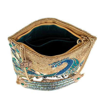 Elegant beaded clutch with intricate blue and gold details, and a luxe interior.