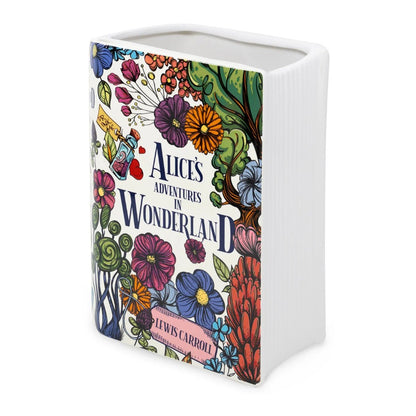 Book-shaped vase with colorful floral design, "Alice's Adventures in Wonderland."