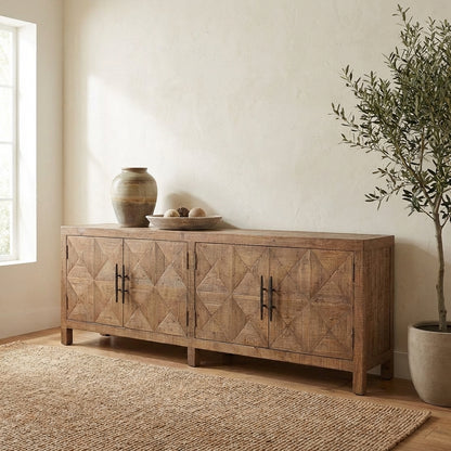 Wooden sideboard with geometric patterns and metal handles.