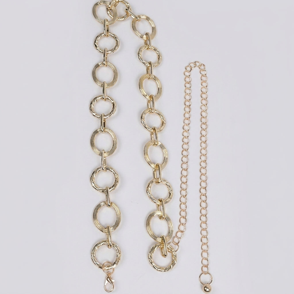 Two different gold chain styles on a white background.