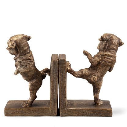 Two bronze dog bookends facing outward with paws against a center divider.