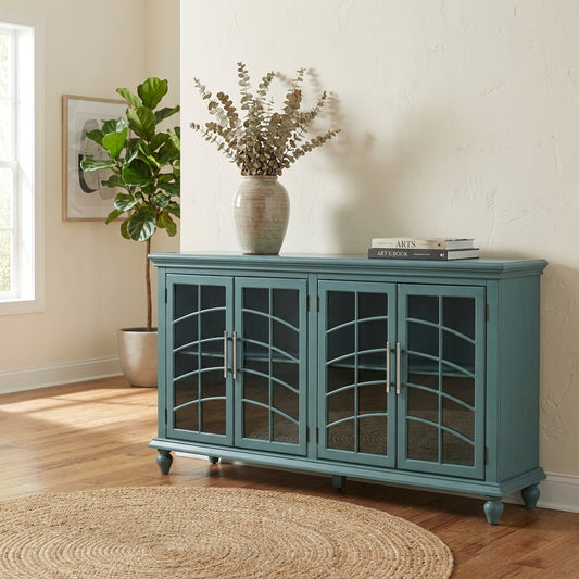 Teal sideboard with glass doors and curved lattice design.