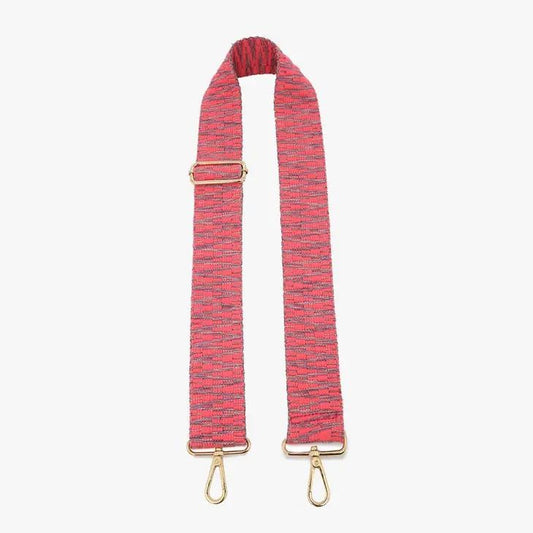 Red and pink woven bag strap with gold clips.