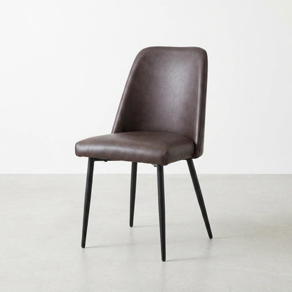 Modern brown chair with black metal legs.