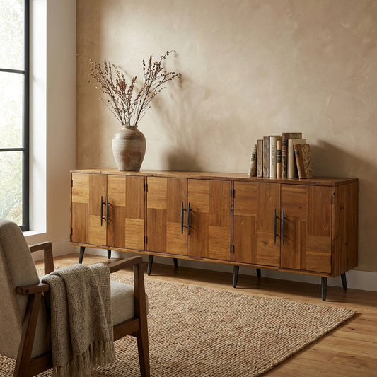 Mid-century modern wooden sideboard with black handles.