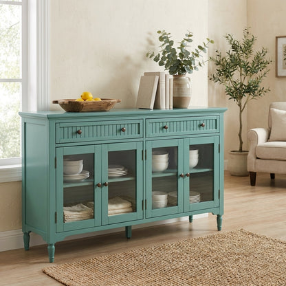 Teal cupboard with glass doors, plants, and a cozy room setting.