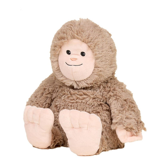 Cute, fluffy plush toy with a smiling face and big feet.