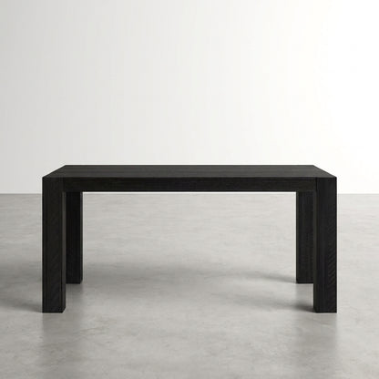 Black rectangular table on a gray floor.