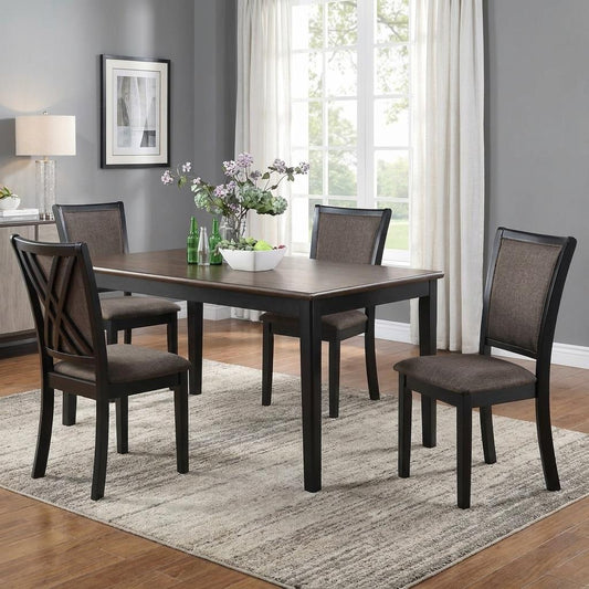 Modern dining room with table, chairs, and a centerpiece.