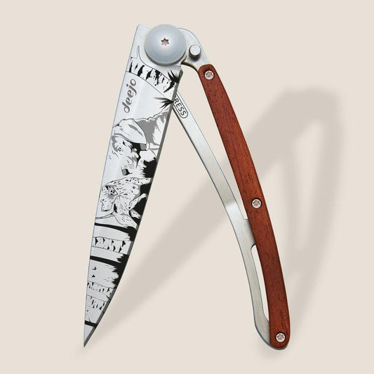 Folding knife with engraved blade and wooden handle.