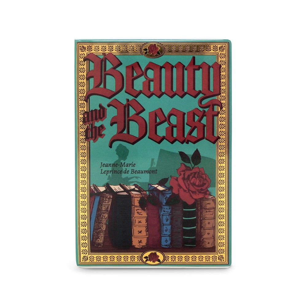"Beauty and the Beast" book cover with ornate design.