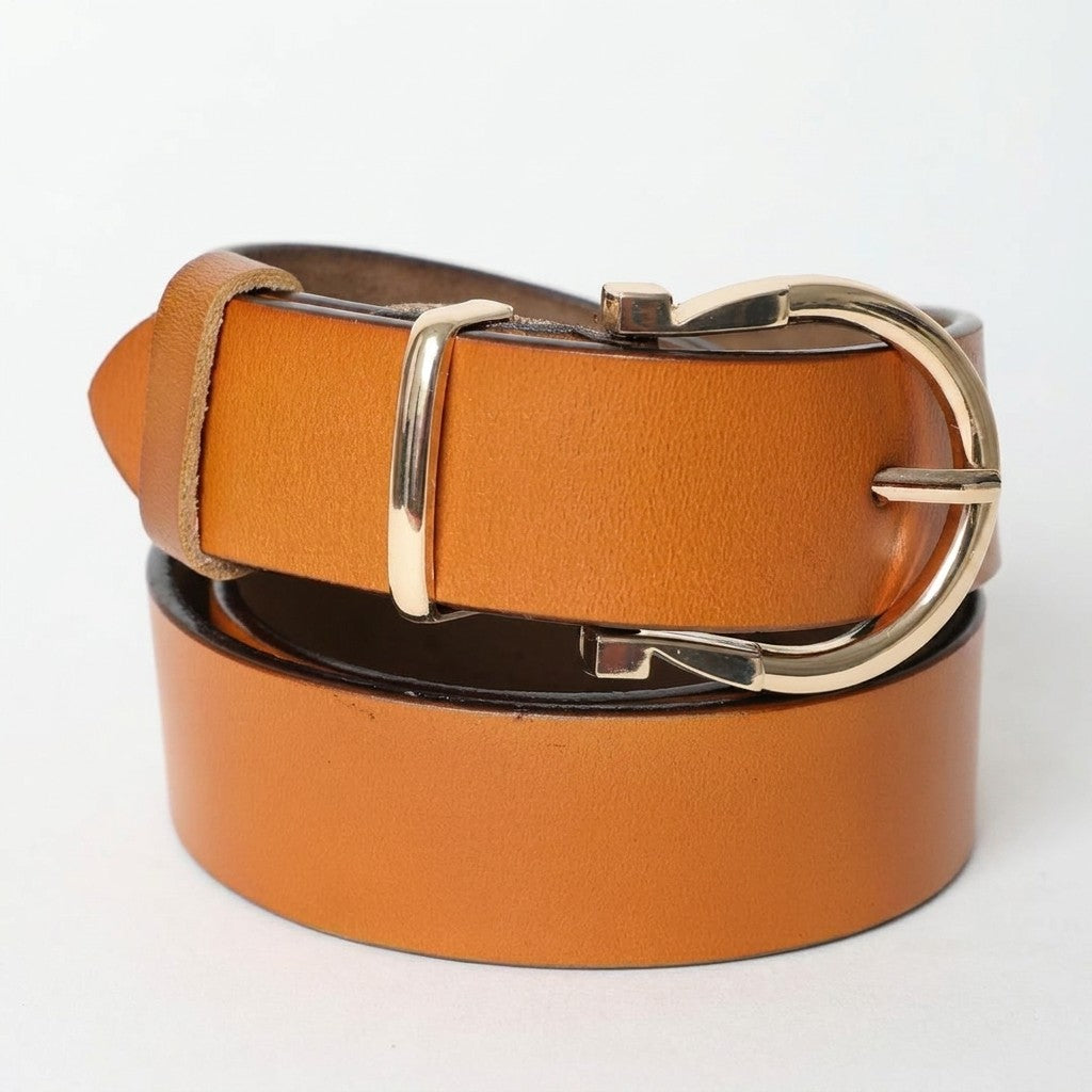 Tan leather belt with a shiny gold buckle, rolled up neatly.