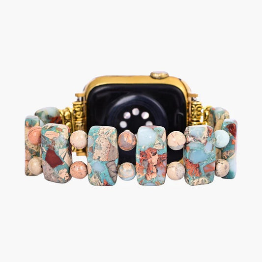 Gold watch with a colorful stone bead bracelet.