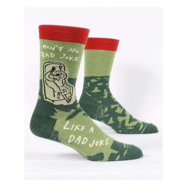 Green socks with "Ain't No Bad Joke Like a Dad Joke" text, red tops.
