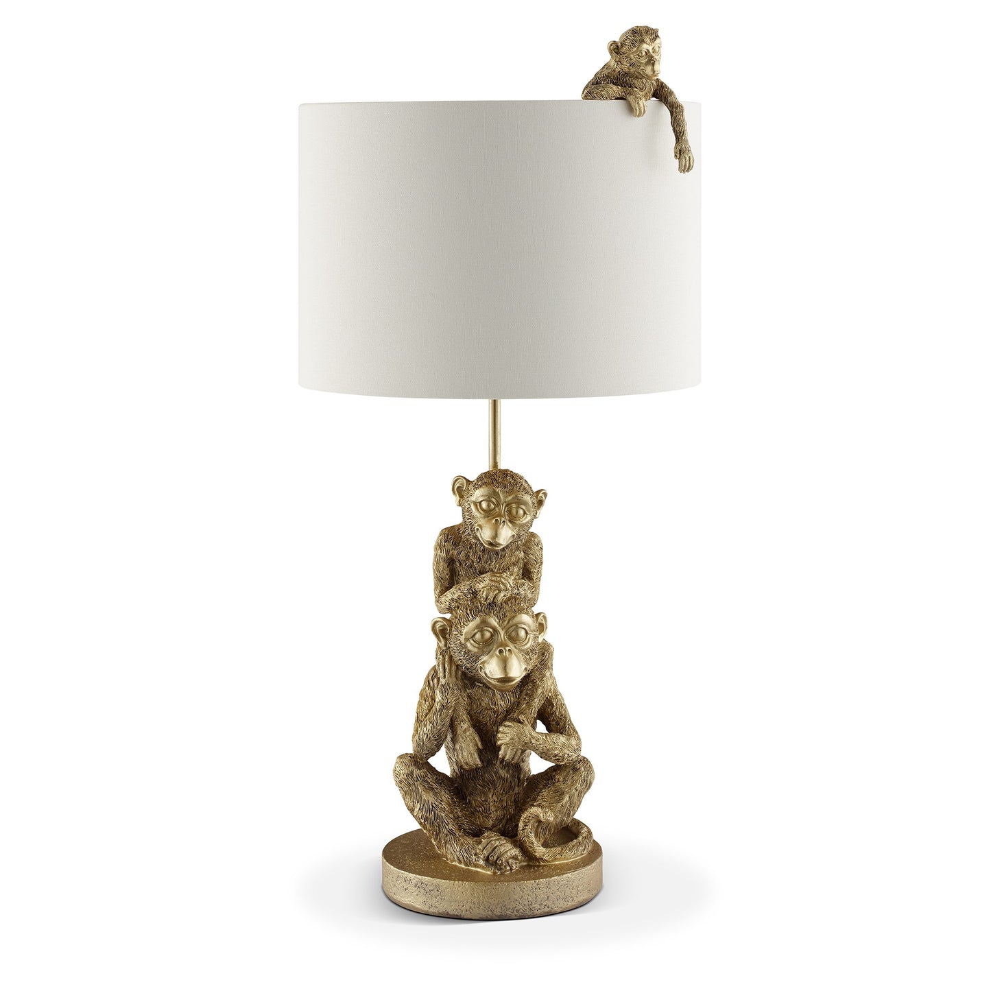 Gold monkey lamp with white shade and monkey accents.