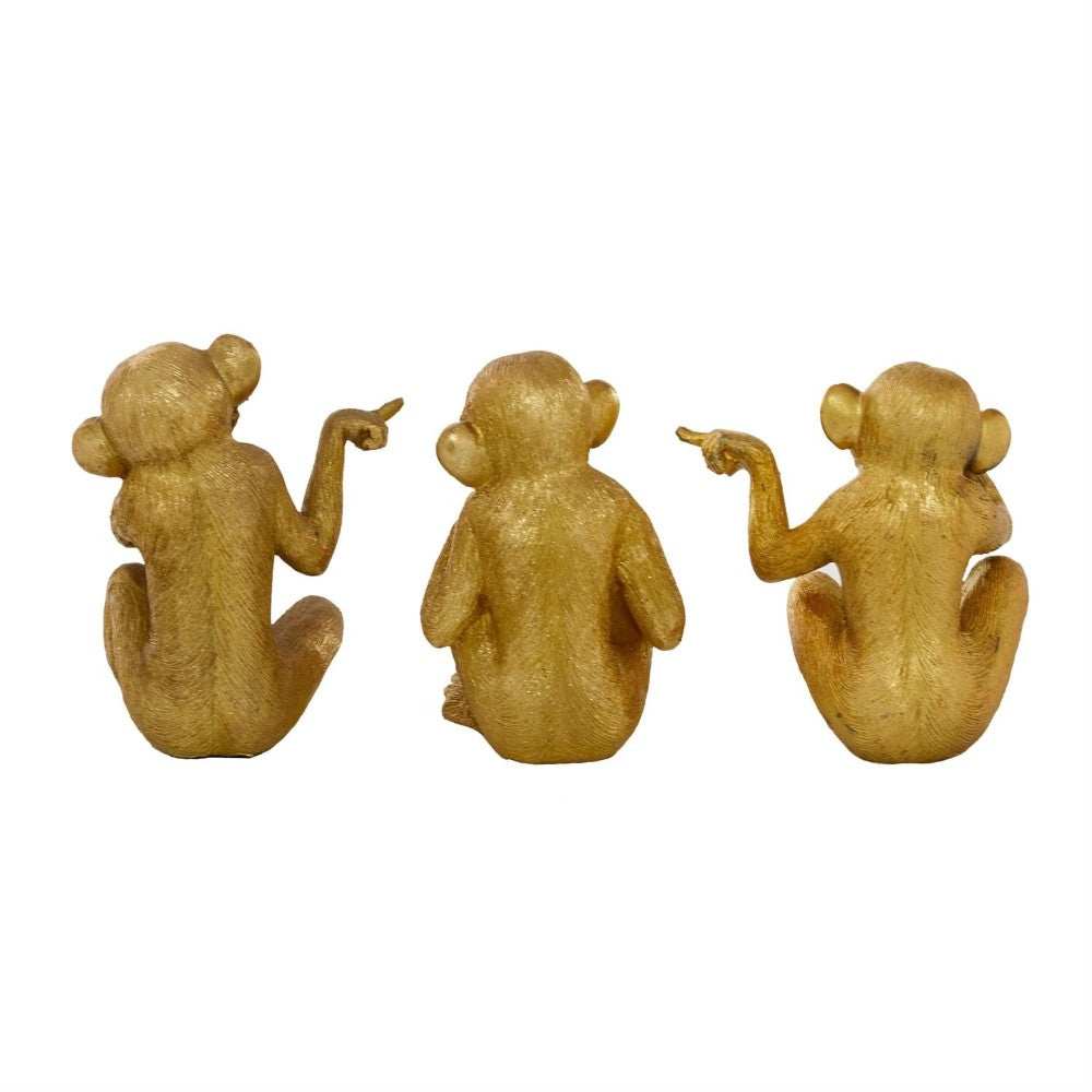Three gold monkey figurines sitting, pointing.