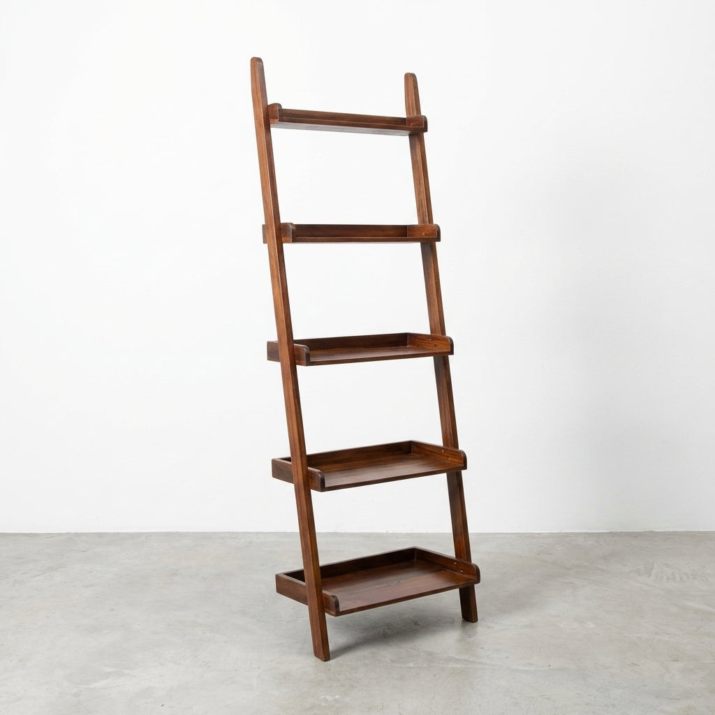 Wooden ladder-style shelf with four tiers against a white wall.