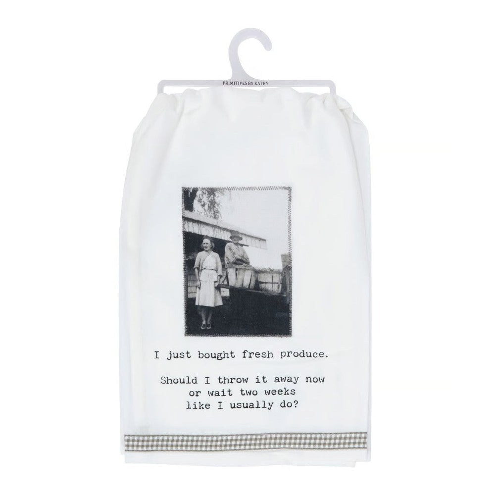 White towel with a vintage photo and a humorous quote about fresh produce.