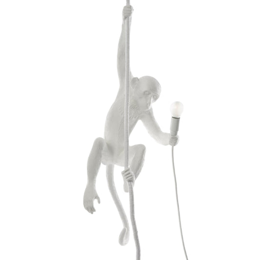 White monkey lamp holding a bulb while climbing a rope.