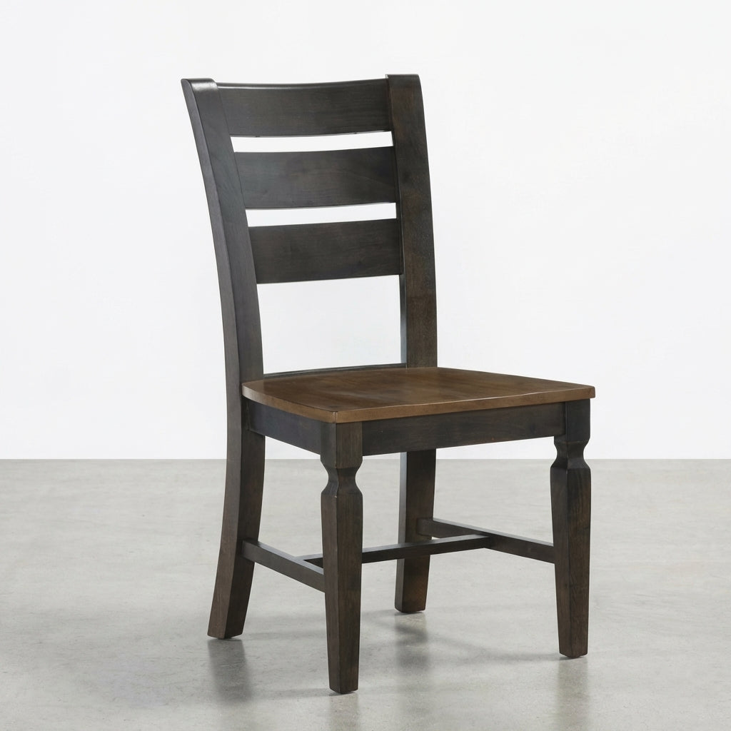 Dark wooden chair with ladder back design.