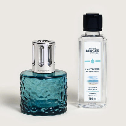 Decorative blue lampe and refill bottle by Maison Berger Paris.