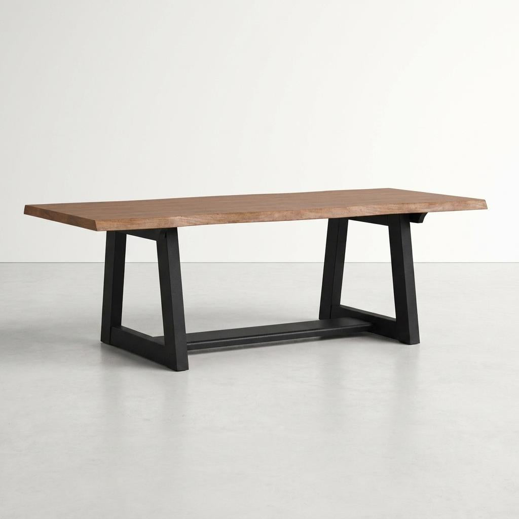 Wooden table with black metal legs on a light background.