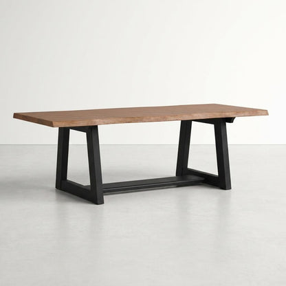 Wooden table with black metal legs on a light background.