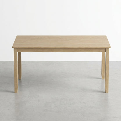 Simple wooden table with four legs.