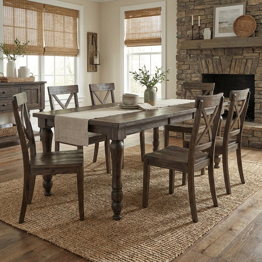 Dark wooden dining table with turned legs, wide and extended.