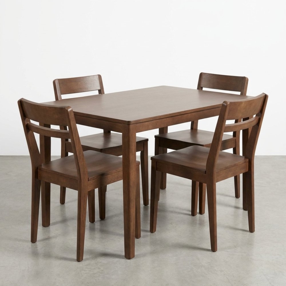 Wooden dining table with four matching chairs.