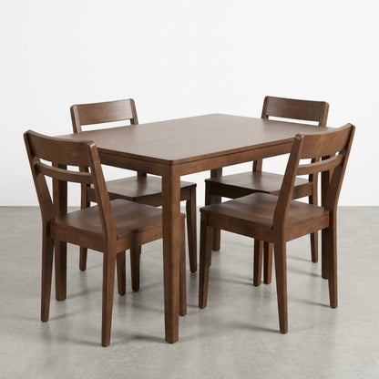 Wooden dining table with four matching chairs.