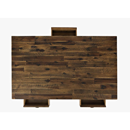 Wooden table with three open drawers, top view.