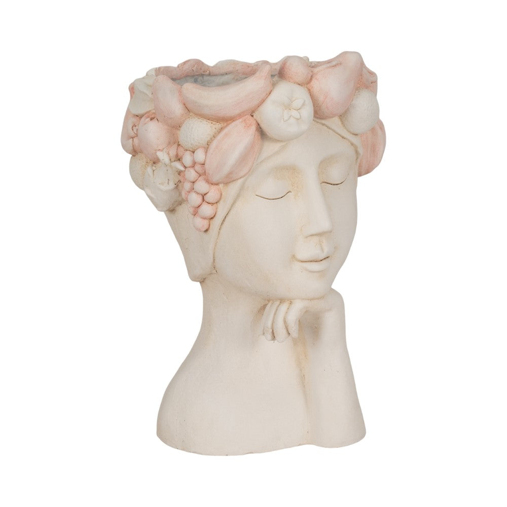 Bust planter with serene face and fruit atop the head.