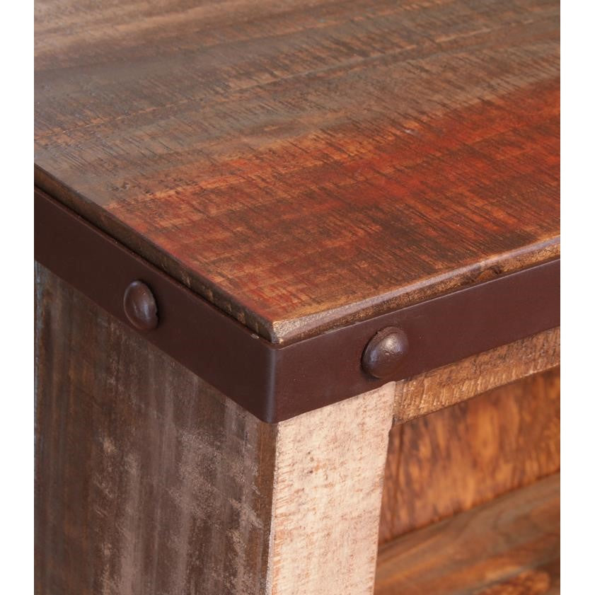 Wooden table corner with metal trim and rivets.