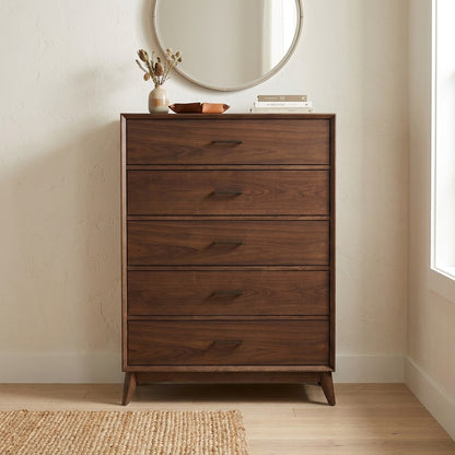 Mid-century modern walnut dresser with five drawers.