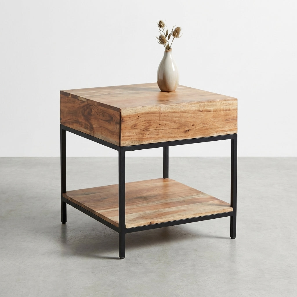 Wooden side table with metal legs, featuring a vase with dried flowers on top.
